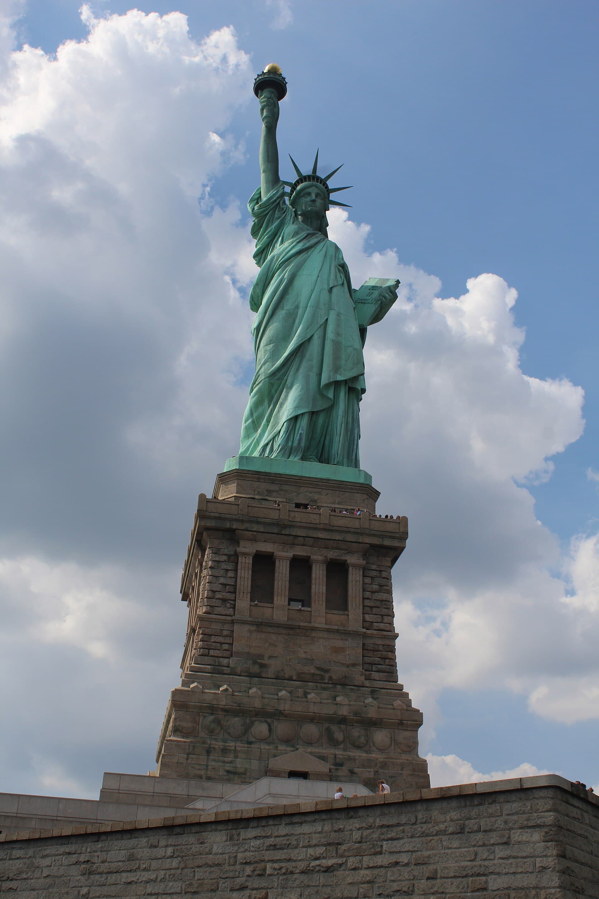 Statue of Liberty centered against the New York sky